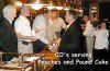 Comanche_Reunion_2003_COs_Serving_Dessert_from_Machin.jpg (91259 bytes)